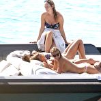 Third pic of Tania Cagnotto sunbathing topless on a boat
