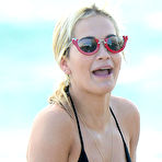 Third pic of Rita Ora in black bikini on a beach in Miami