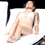 First pic of Katie Waissel sunbathing in white bikini