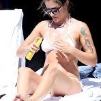 Second pic of Katie Waissel sunbathing in white bikini