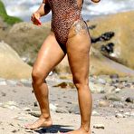 First pic of Christina Milian in leopard print swimsuit