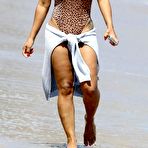 Third pic of Christina Milian in leopard print swimsuit