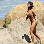 Fourth pic of Christina Milian in leopard print swimsuit