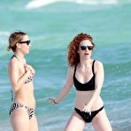 First pic of Jess Glynne in black bikini on a beach