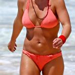 First pic of Britney Spears in coral bikini on a beach