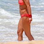 Third pic of Britney Spears in coral bikini on a beach
