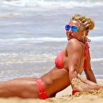 Fourth pic of Britney Spears in coral bikini on a beach
