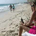 First pic of Sunbathing Lori Anderson in shades and pink bikini gives a close-up of her arm hair 