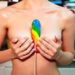 Second pic of Jay Marie sucking on an erotic lollypop at the snack bar