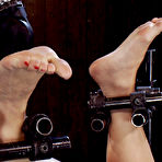 First pic of Screaming slave girl Dylan Ryan gets her body fixed upside down before hard foot caning.
