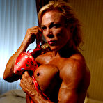 Second pic of Topless middle-aged bodybuilder Lauren Powers shows off her hard muscles and big tits