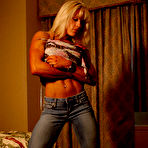 Third pic of Tight blonde haired bodybuilder Amy Peters in blue jeans shows her black bra