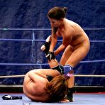 Third pic of Busty lesbian fighter Bellina fucks defeated Rihanna Jamuel with strapon in the ring