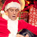 Second pic of Angela White rides Santa's big fat dick by the Christmas tree