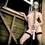 First pic of Pierced Soma Stardust in fishnet stockings and gas mask dildo fucks her cunt