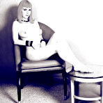 Fourth pic of Naked alternative lady Szandora poses on a chair making no secret of her snatch