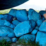 Fourth pic of Delicious Teodora takes off her black bodysuit on big blue rocks