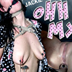 First pic of SexPreviews - Jackie Ohh is spread bound in rope with a smile on her face with big tits clamped