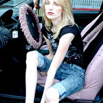 Third pic of Skinny blonde Kelly FootFactory with slim legs kicks off her red shoes in a car