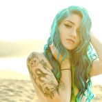 Third pic of Tattooed babe Fay teasing in panties on the beach | Erotic Beauties
