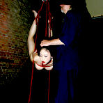 First pic of Naked slave brunette Ageha Asagi hanging from the ceiling with hands behind her back