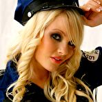 Second pic of Faith stripping out of a police uniform (Only Tease)