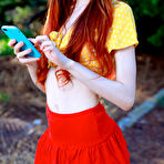 First pic of Sherice Pale Redhead in a Red Miniskirt