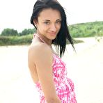 First pic of Gorgeous teen Aprilia B is performing the turning on nude pussy posing on the beach