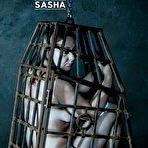 First pic of SexPreviews - Sasha long hair stockings submissive is bound in metal cage her pussy toyed to orgasms