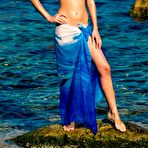 First pic of Aquamarine A revealing her small tits on by the ocean