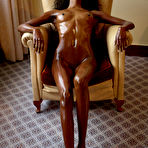 Fourth pic of Brown girl poses naked in the arm-chair