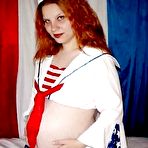 Fourth pic of Pregnant redhead taking off her sailors uniform - 14 Pics | xHamster