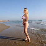 First pic of BikiniFanatics - Curvy blonde beach babe loves to flash her boobs