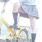 Third pic of Japanese idol Megumi Aisaka teasing in upskirt panty shots on bicycle | Erotic Beauties