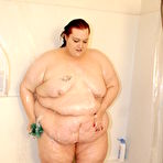 Fourth pic of Ugly overweight woman Demisis poses naked in the bathroom and takes a shower