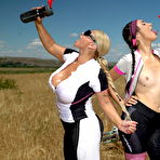 Fourth pic of These old and young lesbians ride bikes and lick pussy in public