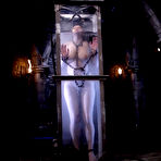 Third pic of Chain bound curvy Aria Giovanni with huge tits in a water tank for Isis Love's pleasure