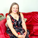 First pic of Curvy mature lady masturbating in her livingroom