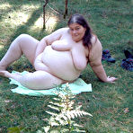 Third pic of Fat naked MILF outdoors