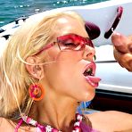 Second pic of Blonde Stacy Silver in pink bikini gets double dicked and swallows sperm at the riverside