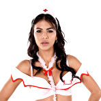 Second pic of Katerina Sol in her slutty nurse uniform and pink fishnets