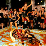 First pic of Two clothed messy wrestlers Mila Dark and Lucy Cornet have fun in front of female audience