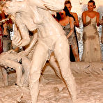 Third pic of Bikini girls Sara and Cameron Gold wrestle in the mud in front of dozens of curious women