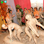 Third pic of Dionne Darling takes part in public mud wrestling at the all-girl party