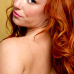 Fourth pic of Dani Jensen Beautiful red head Dani Jensen gives a little peep show on a chair.