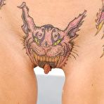 Fourth pic of Bizarre amateur pussy - tatooed - 26 Pics | xHamster