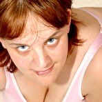 First pic of Plumper mama exposed her monster breasts on white carpet