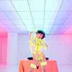 First pic of Mia Valentine looks seductive while posing in neon lingerie and stripping it off