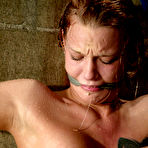 Third pic of Redhead Natanha gets rope bound and water tortured by master Thane after leaving the cage