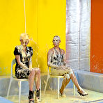 Third pic of Clothed party girls Leony April and Laura Crystal sit down to takes a messy shower